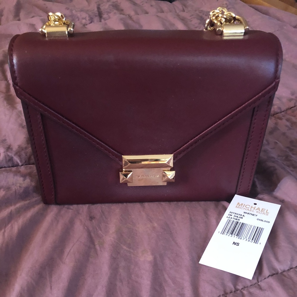 Whitney in oxblood barely used